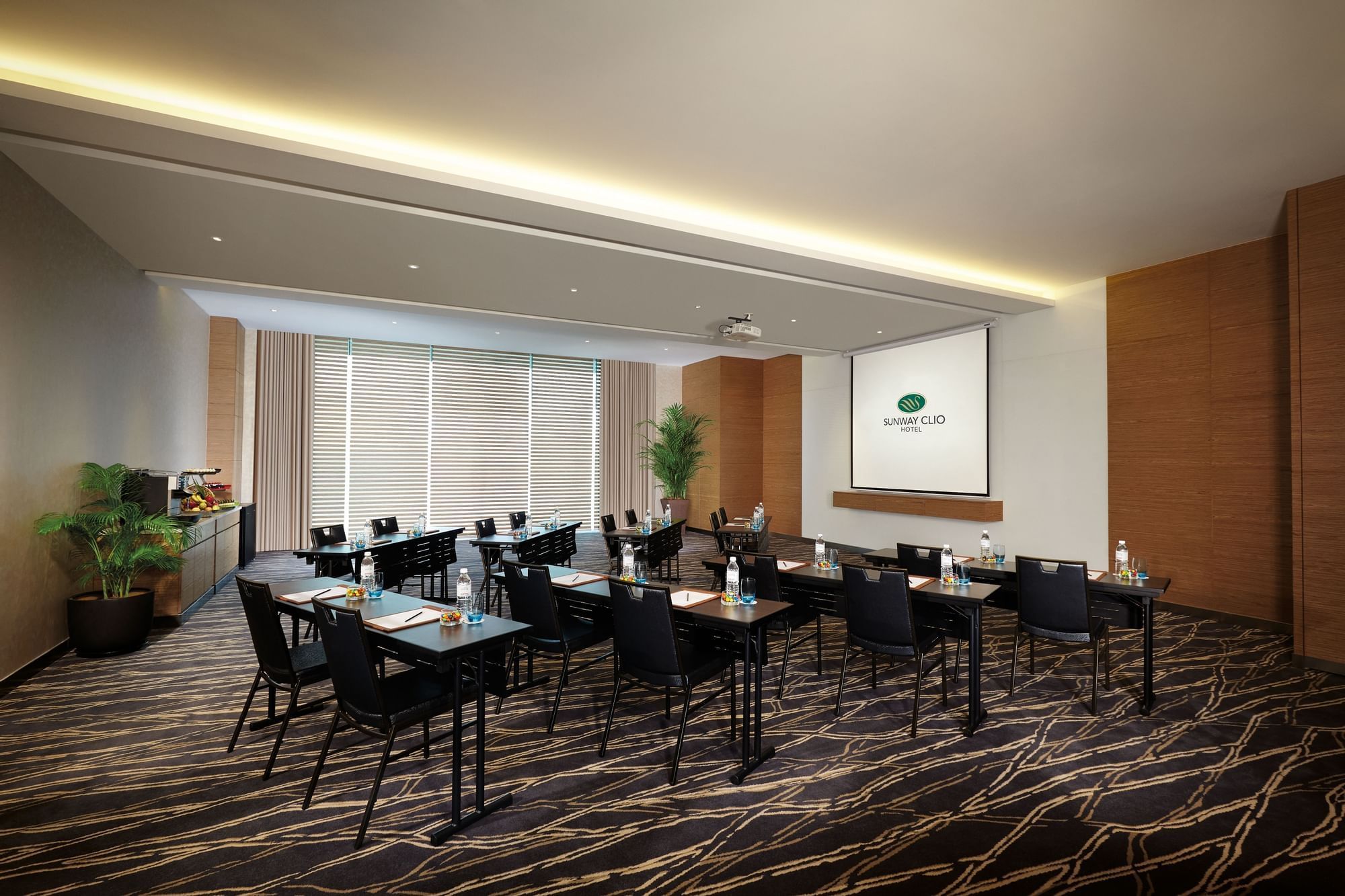 Classroom-style table arrangements in a hall at Sunway Lagoon